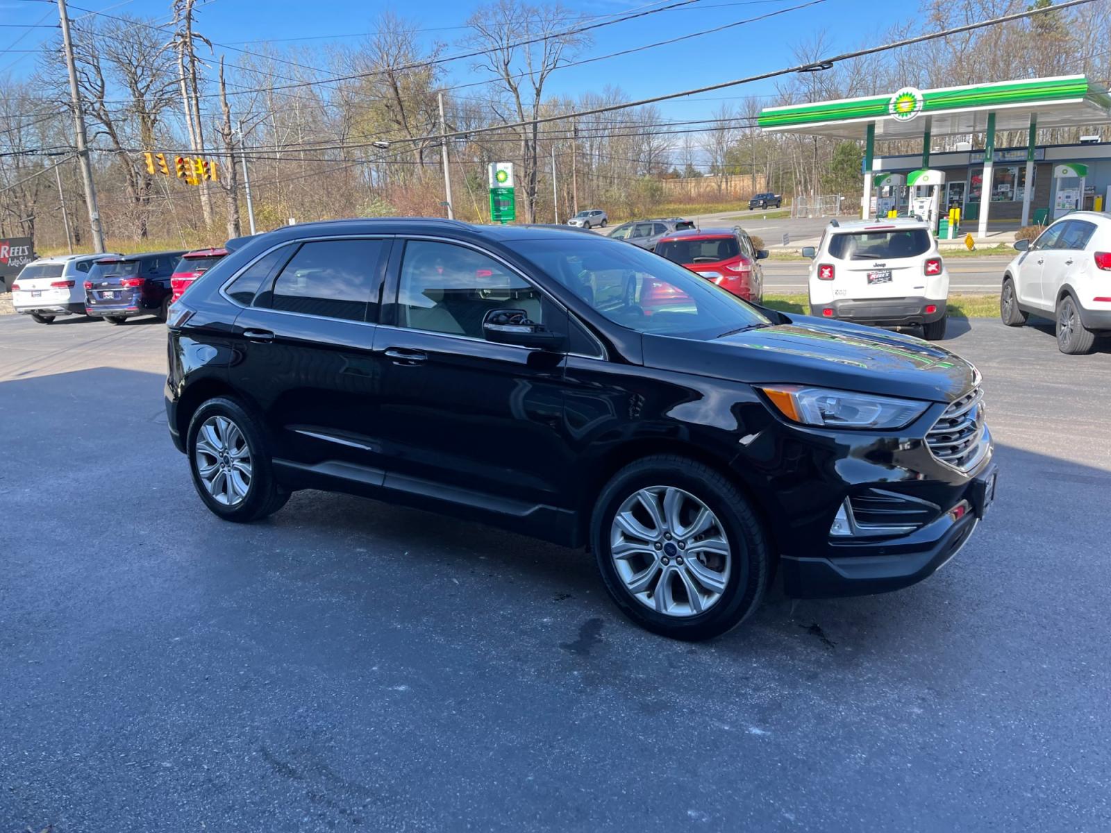 Reel's Auto Sales - 2020 Ford Edge Titanium AWD